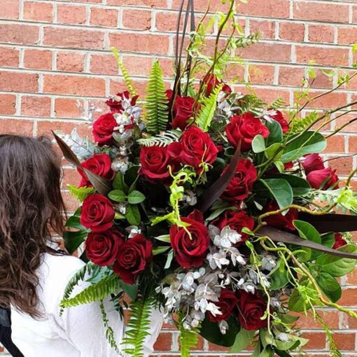 Woman Carrying Red Roses Flower Bouquet Arrangement