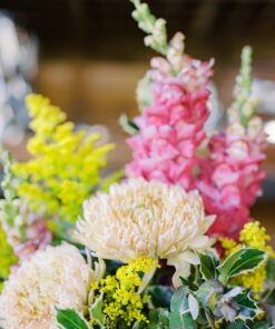 Closed Up Photo of Floral Arrangement of Seasonal Blossoms