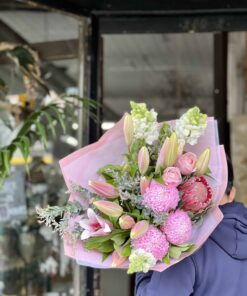 Man Carrying The Bings A Smile Bouquet Over His Shoulder