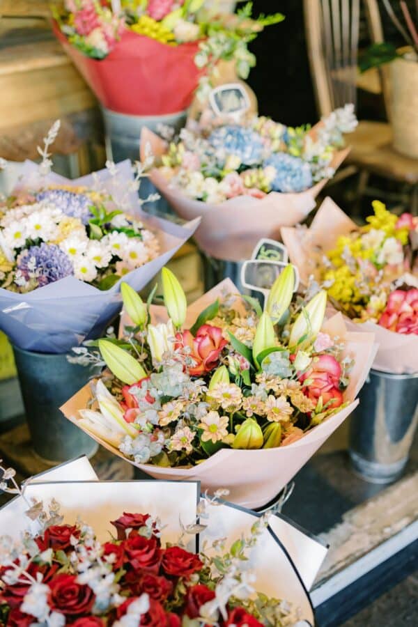 A bunch of flower bouquets in a vase