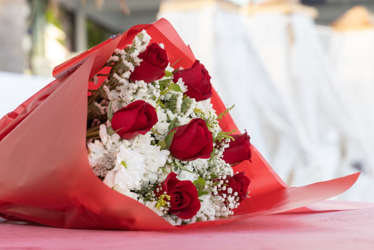 Bouquet of Red Roses on the Table